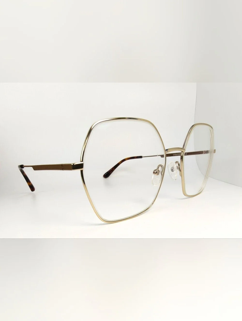 Elixir. Titanium.Gold Polygon. Metal Frame Women's Eyewear.